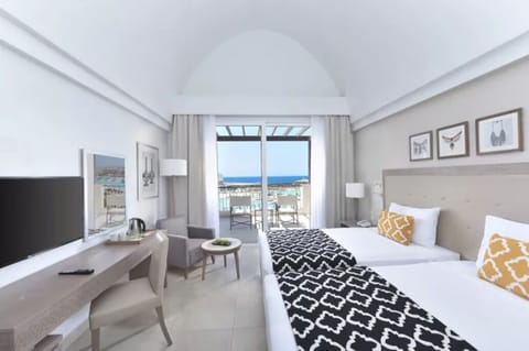 Recharge in bright twin beds with breezy balcony views.