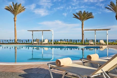 Dive into sparkling infinity waters with calming sea views.