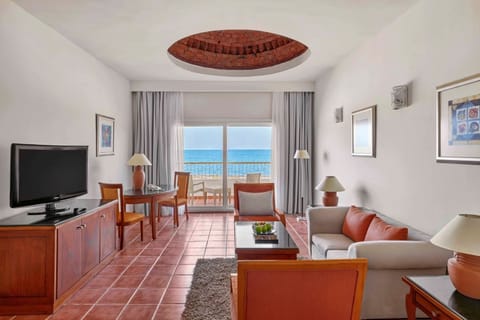 Wake up to endless ocean views from your plush bed.