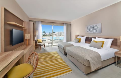 Wake up to sunshine and pool views from bed.