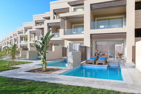 Sip coffee as ocean-blue horizons frame your private terrace.