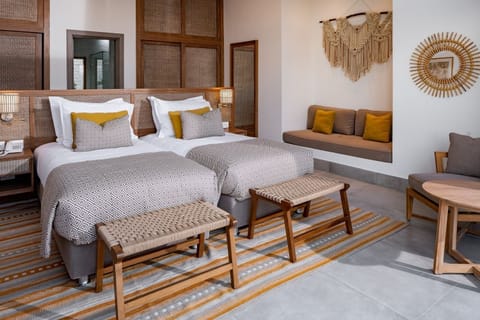 Settle into twin beds with calm, boutique-style finishes.