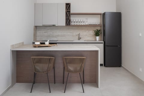 A fully equipped summer kitchen complete with a kitchen island