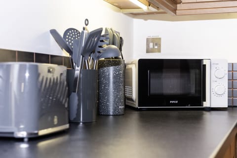 Kitchen comes fully stocked with microwave, toaster, kettle - all appliances and utensils supplied
