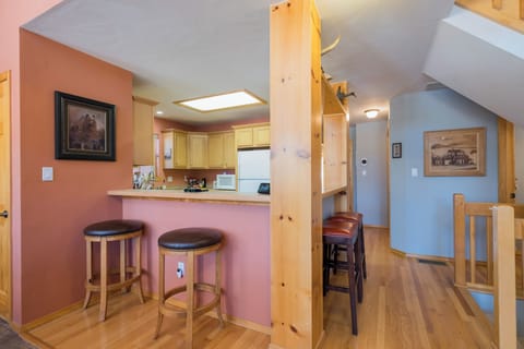 Open kitchen with 4 bar stools