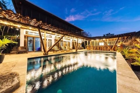 828x551 Pool towards bar at night wide angle 