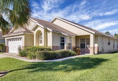 Sunlit front porch welcomes you to peaceful relaxation