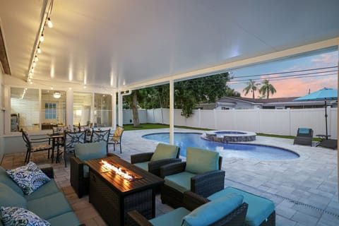 Heated pool, fireplace and fully fenced backyard