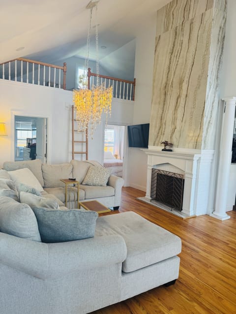 Lounge under a fabulous cascading whimsical light fixture in our living room. 