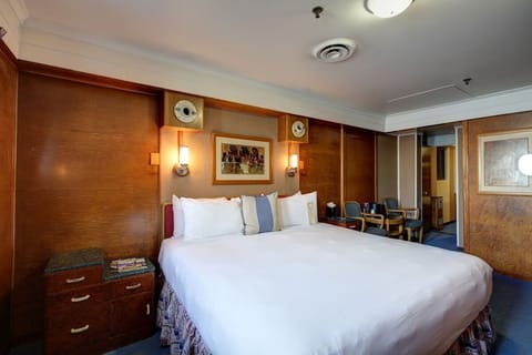 Stretch out on a king bed in a serene escape.