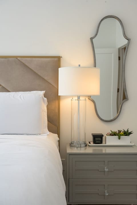 Primary bedroom with king bed, en suite bathroom and private balcony