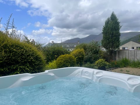 Unwind in the hot tub after a day on the fells.