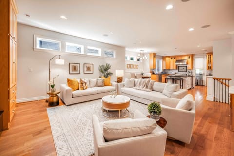 Sunlit lounge with cozy seating – the heart of the home.