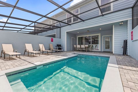 Sparkling private pool with lounge chairs