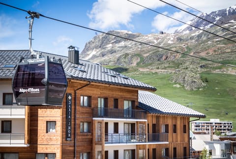 Mountain gondola passes right by the residence, offering instant access to the slopes.