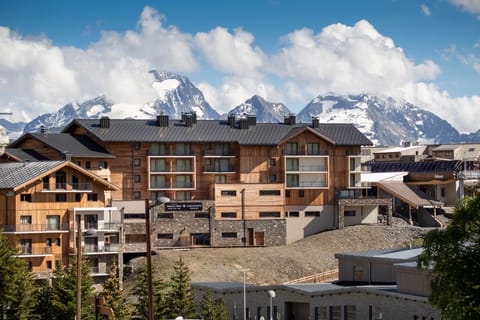 Wake up to breathtaking alpine views—Daria-I Nor nestles in the heart of the peaks, glowing under summer skies.