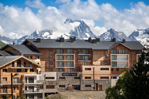 Elegant alpine architecture set against the dramatic peaks of Tignes.