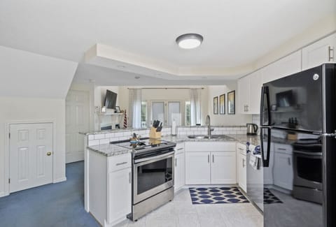Cook, dine, and connect in this modern, fully stocked kitchen.