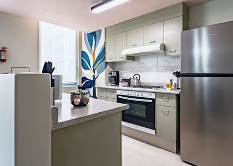 Another perspective of a modern kitchen with sleek countertops