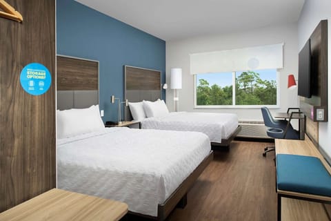 Stretch out comfortably in a spacious double-queen room with view.