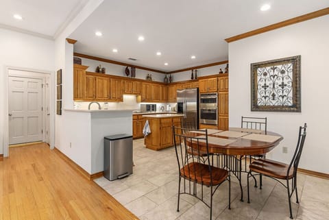 Large open kitchen with ample cupboard space and modern appliances