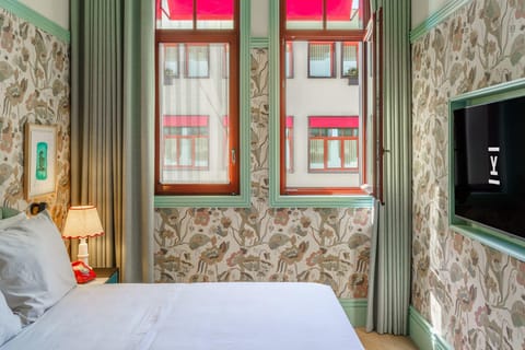 Wake to natural light and charming neighborhood window views.