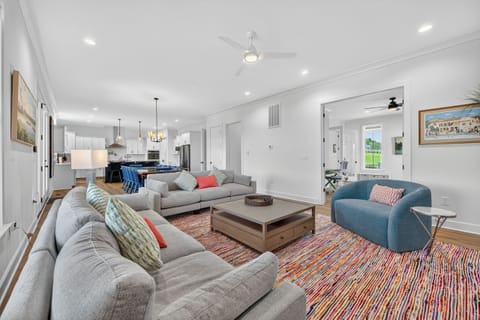 Natural light floods this cozy space, perfect for reading or sipping coffee.