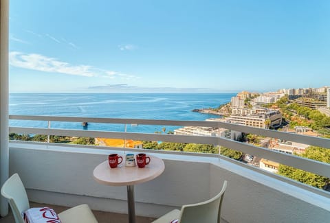 Sip morning coffee on the balcony with endless sea views.