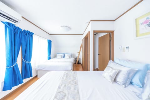 A clean, welcoming sleep space with thoughtful touches—ideal for a good night’s sleep
