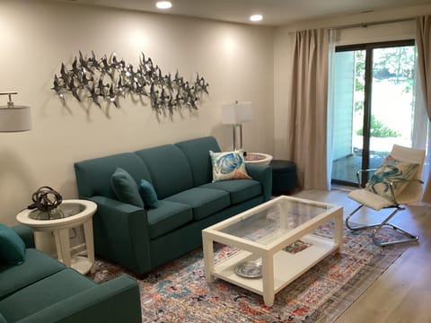 Living room has a Queen pullout couch for extra guests.