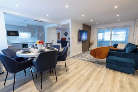 Full picture of living room, dining area, and kitchen
