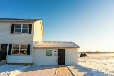 A 1 bedroom apartment attached to a tri-plex unit.