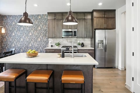 Whip up memories (and maybe a gourmet meal or two) in our stylish and functional kitchen. Whether you're a master chef or a cereal connoisseur, we've got you covered.