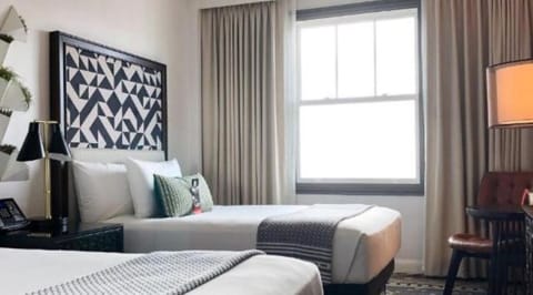 Unit with 2 Double size beds. Room views may vary based on location and availability