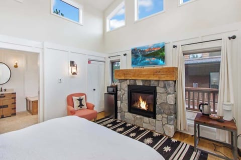 Sitting Area with Fireplace, TV, & Mini Fridge