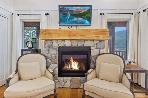 Sitting area with fireplace and TV