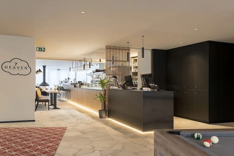 Arrive and unwind in a sleek, welcoming lobby lounge.