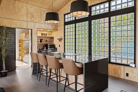 Gather comfortably with dining space for 4 guests.