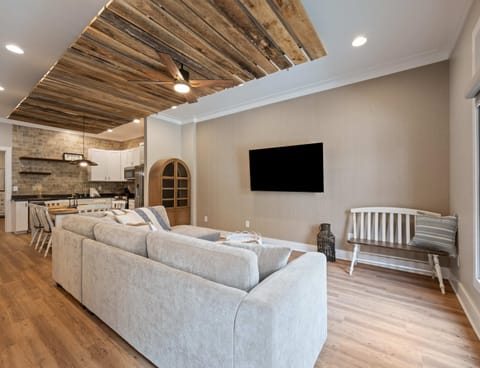 Curl up in the chic living room & stream your favorites on the smart TV​