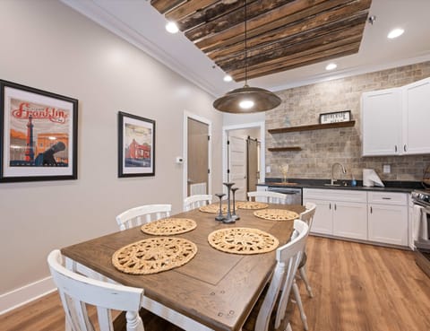 The charming eat-in kitchen offers ample space & every home comfort​