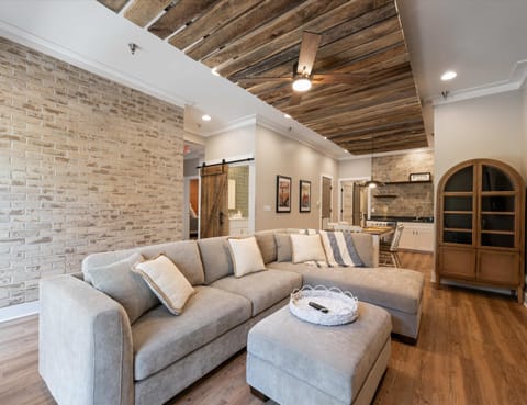 Curl up in the chic living room & stream your favorites on the smart TV​