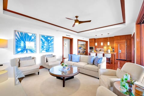 The tastefully decorated living room invites you and your guests to relax