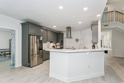 Large bar overlooking the kitchen