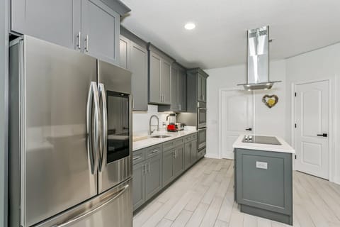 Gorgeous kitchen with high end appliances and quartz counters