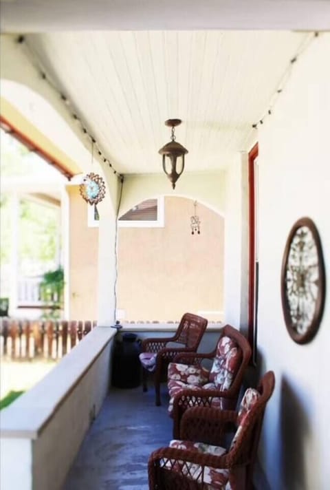 Charming front patio — perfect for morning coffee or evening relaxation.