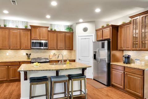 Fully equipped and stocked gourmet kitchen.