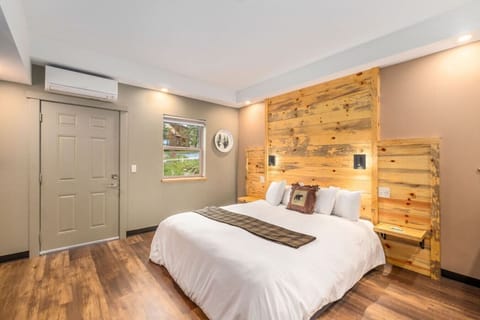 The door next to the bed leads to an ADA accessible parking spot