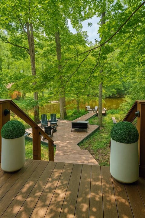 Walk barefoot from the front door down to the dock along the decks and boardwalk