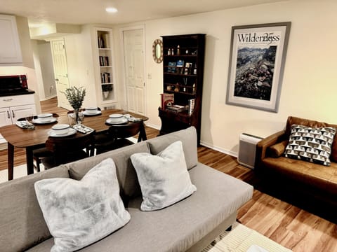 Living, Dining, and Kitchenette with hallway leading back to bed/bath pictured