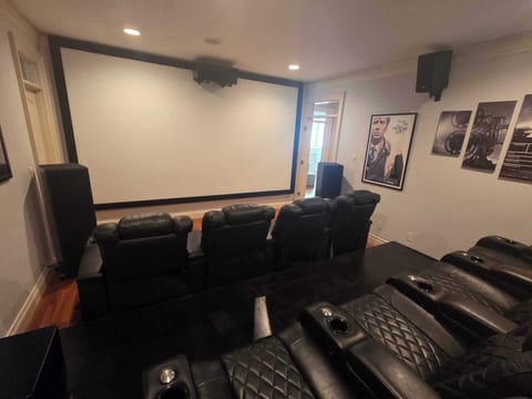 Private home theater with seating for seven
